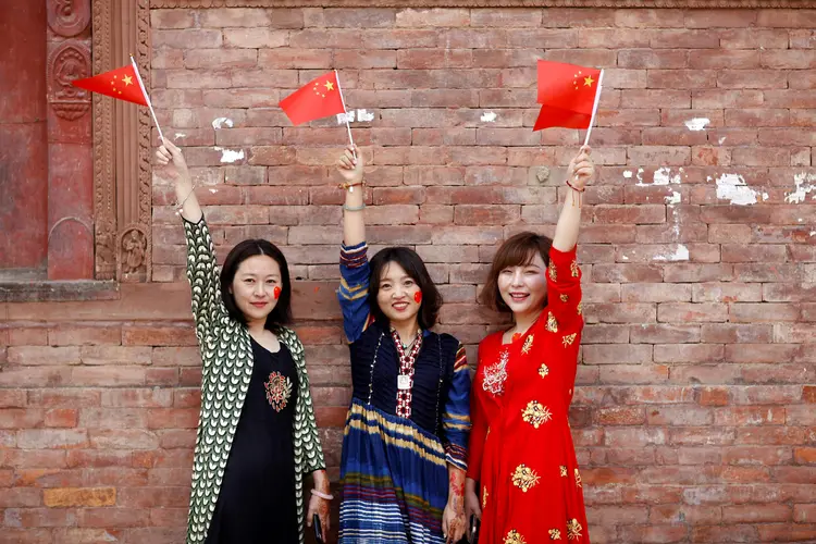 Aniversário de 70 anos da Revolução Comunista na China: inspirados por celebridades patrióticas, jovens inundam redes sociais com postagens defendendo a China (Monika Deupala)