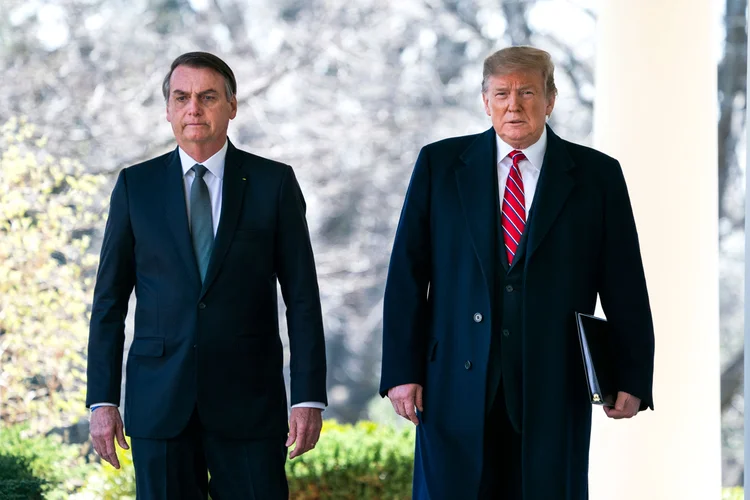 Trump e Bolsonaro: em maio, presidente norte-americano declarou apoio oficial à entrada do Brasil na OCDE (Pool/Getty Images)