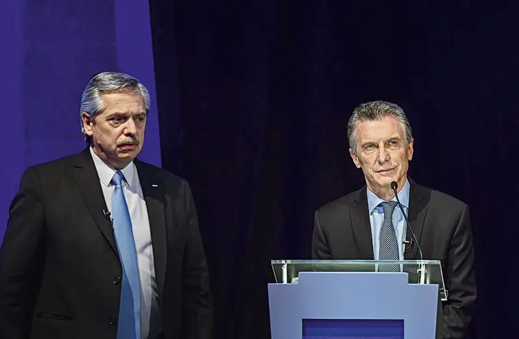 Os candidatos Alberto Fernández e Mauricio Macri: a difícil escolha entre seguir com as políticas atuais e voltar para o kirchnerismo (Ronaldo Schemidt/AFP)