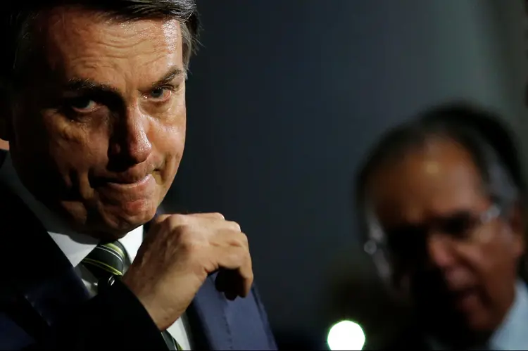 Bolsonaro e Guedes: presidente saiu em defesa do ministro após declarações polêmicas (Adriano Machado/Reuters)