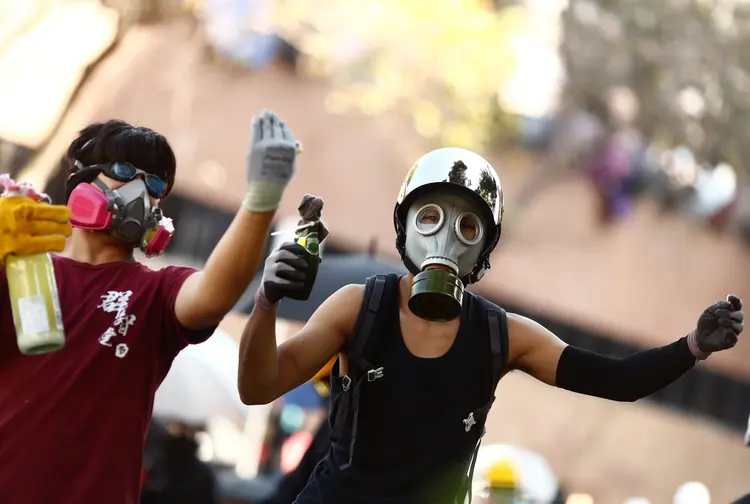 Hong Kong: o uso de máscaras em protestos é proibido desde outubro (Thomas Peter/Reuters)