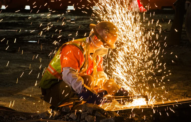 Em outubro, foram criados 128 mil novos postos de trabalho nos Estados Unidos (Tristan Savatier/Getty Images)