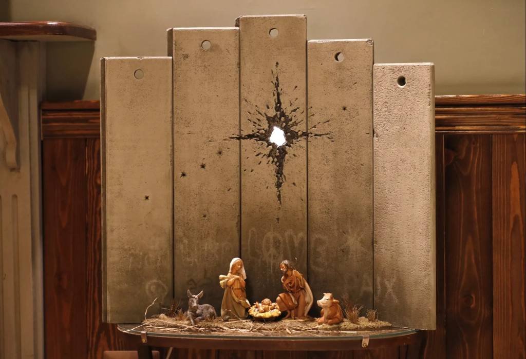 Banksy apresenta em Belém uma obra de Natal sombria