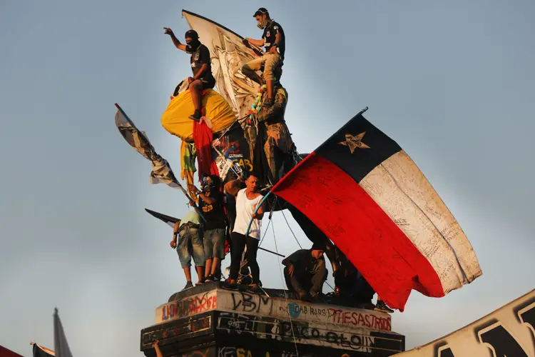 Protestos no Chile: economia chilena foi devastada por manifestações e violentos distúrbios (Spencer Platt / Equipe/Getty Images)