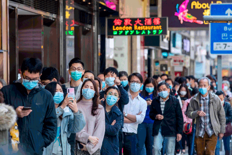 Coronavírus: 31 brasileiros que moram em Wuhan e que desejam retornar ao país, informou o advogado (Paul Yeung/Bloomberg)