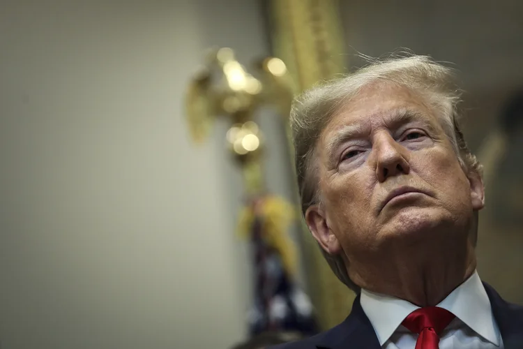 Trump: republicano se tornou o terceiro presidente dos EUA a ter acusações de impeachment aprovadas com a votação da Câmara (Drew Angerer/Getty Images)