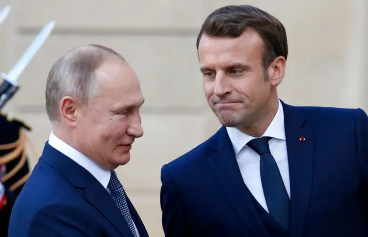 Emmanuel Macron e Putin: os dois lados expressaram preocupação com a morte do comandante da Força Quds (Chesnot/Getty Images)