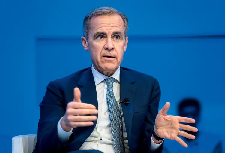 Mark Carney, presidente do banco central britânico: mudança urgente | Fabrice Coffrini/AFP