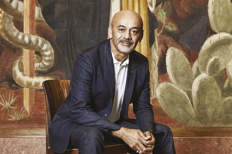 O designer de sapatos, Christian Louboutin