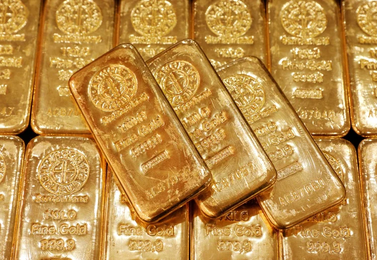 Barras de ouro são exibidas no escritório central da GoldSilver em Cingapura 
 
  (Edgar Su/Reuters)