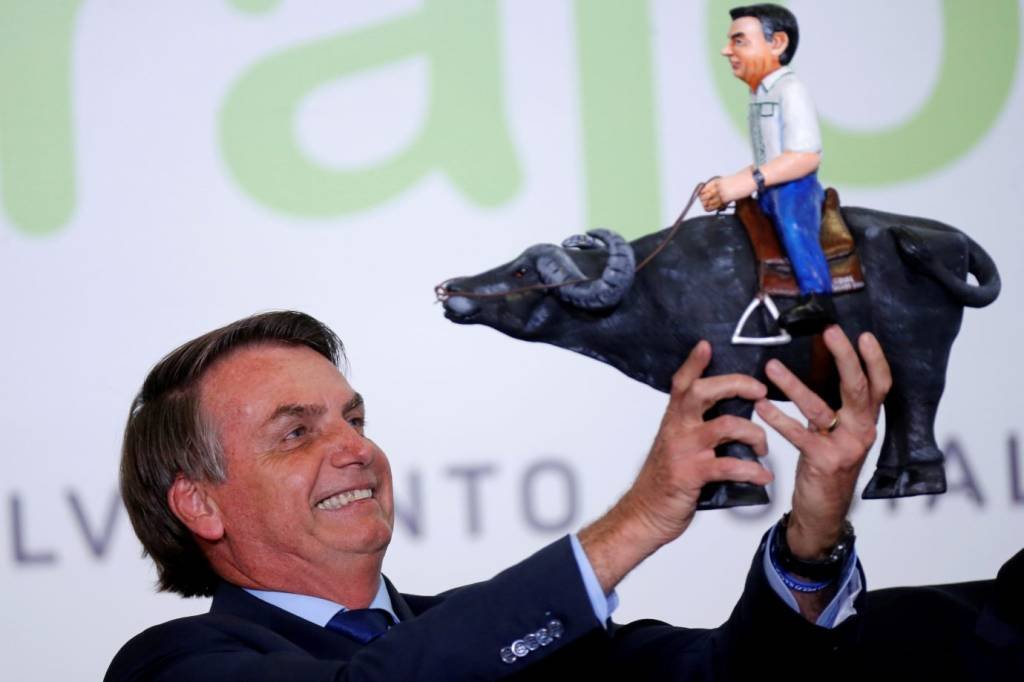 Bolsonaro: a estratégia de se associar ao humor e a falas ofensivas ou inesperadas para o cargo, no estilo troll, adotado por provocadores na internet, não é novidade na trajetória política do presidente (Adriano Machado/Reuters)