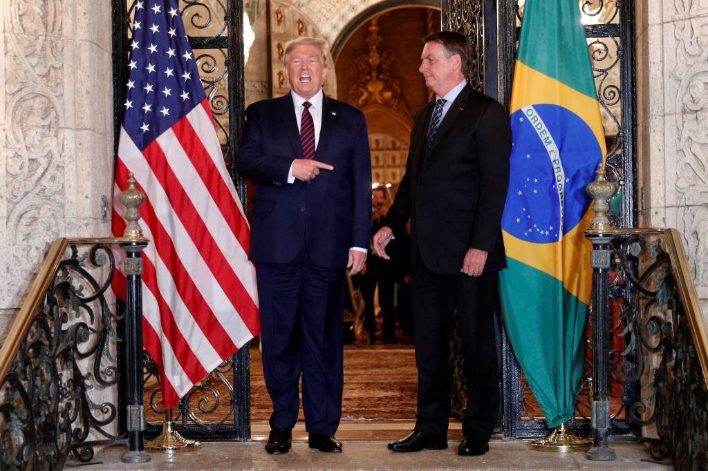Trump e Bolsonaro: A assinatura aconteceu no quartel-general do Comando Sul dos Estados Unidos, localizado em Doral, nas proximidades da cidade de Miami (Tom Brenner/Reuters)
