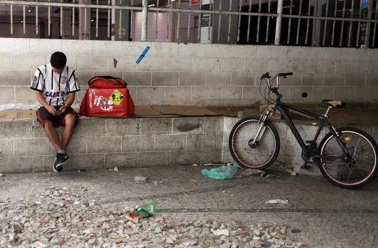 Informal; coronavírus; app (Rahel Patrasso/Reuters)