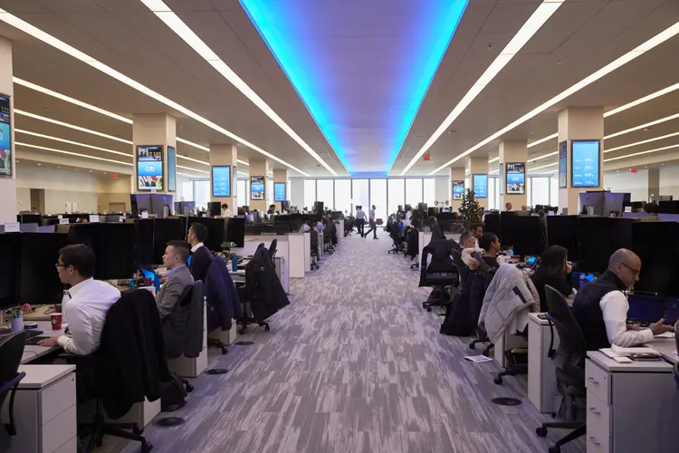 Funcionários trabalham no pregão do Citigroup em Nova York em dezembro (Marc McAndrews/Bloomberg)