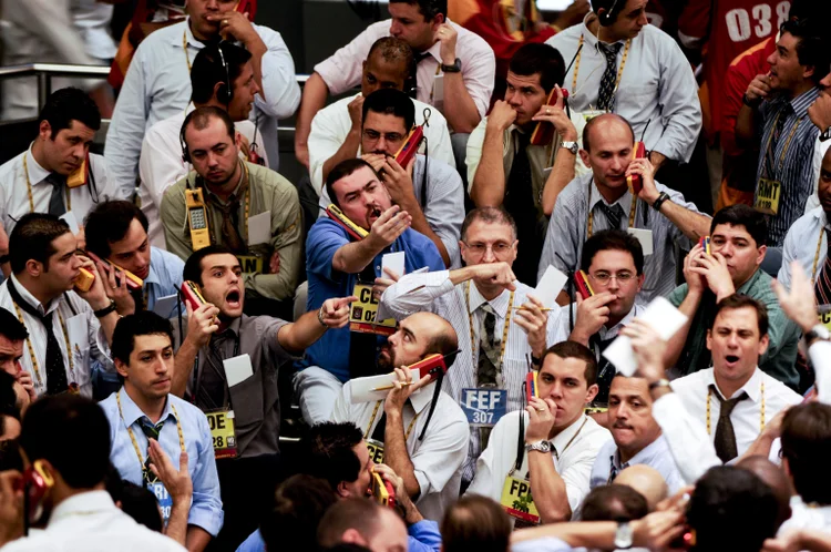 Traders: Você sabe o que é day trade, blue chips, small caps ou benchmark? (Paulo Fridman/Bloomberg)