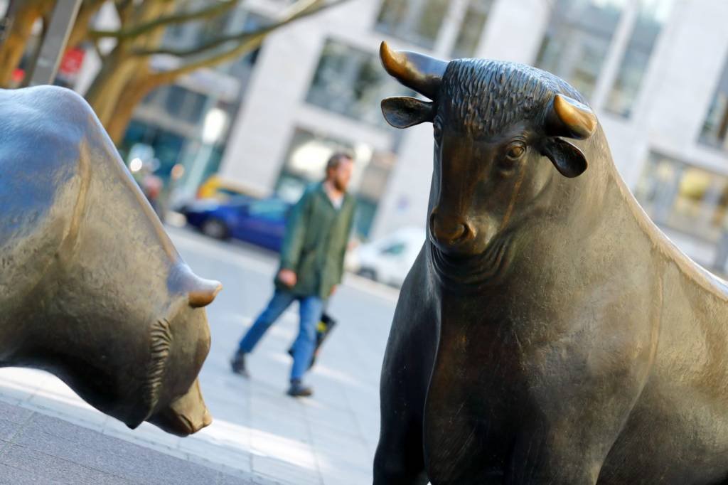 FILE PHOTO: Bull and bear, symbols for rising ad falling stock markets, are seen in front of the German stock exchange. Frankfurt, Germany, March 25, 2020. REUTERS/Ralph Orlowski/File Photo (REUTERS/Ralph Orlowski/Reuters)