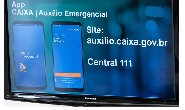 Aplicativo do auxílio emergencial pago pela Caixa: banco estatal terá novamente papel fundamental em programa social (Marcello Casal Jr/Agência Brasil)