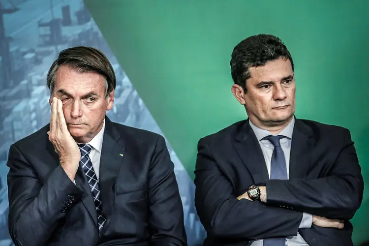 Moro e Bolsonaro: o ex-ministro disse que o presidente tentou interferir em inquéritos federais (Adriano Machado/Reuters)