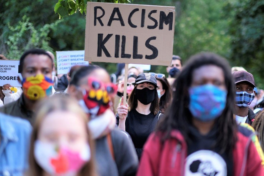 People attend a protest against the fatal injury inflicted by Minneapolis police on African-American man George Floyd, in Berlin, Germany, May 30, 2020. REUTERS/Christian Mang