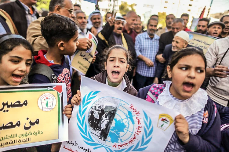 Palestinians take part in a rally in solidarity of renewal of UNRWA mandate, in Gaza city on November 27, 2019.  the UN General Assembly approved the extension of UNRWAs mandate.
The move was supported by 170 countries, with only the US and Israel voting against. Seven countries abstained: Cameroon, Guatemala, Nauru, Marshall Islands, Micronesia, Vanautau, and Canada. (Photo by Majdi Fathi/NurPhoto via Getty Images) (Majdi Fathi/NurPhoto/Getty Images)