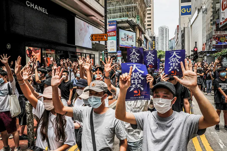 Protesto em Hong Kong: editorial do Diário do Povo, jornal estatal chinês, diz que medidas americanas são uma "interferência grosseira" (Tyrone Siu/Reuters)