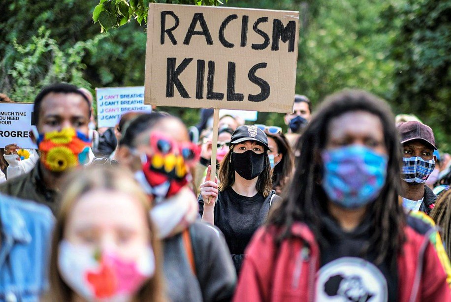 People attend a protest against the fatal injury inflicted by Minneapolis police on African-American man George Floyd, in Berlin, Germany, May 30, 2020. REUTERS/Christian Mang
