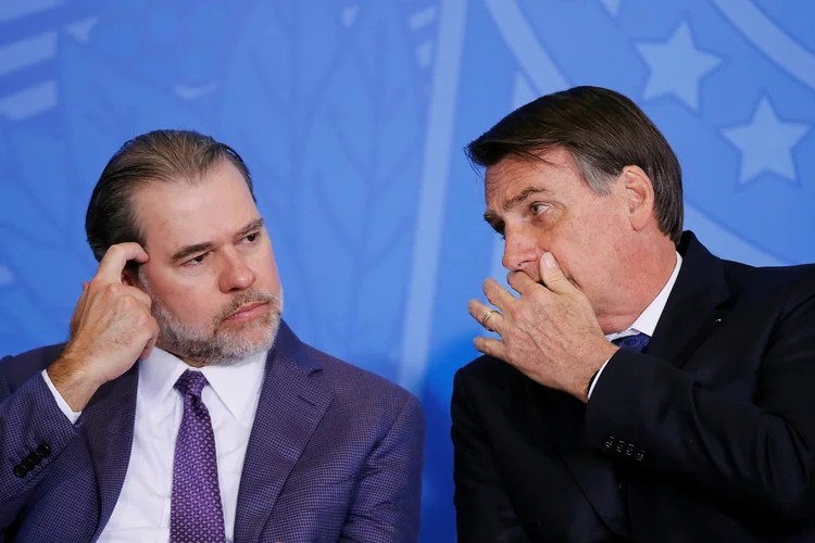 Dias Toffoli e Jair Bolsonaro: em fala antes do presidente, Toffoli destacou que o Estado é um só, com Poderes harmônicos (Adriano Machado/Reuters)
