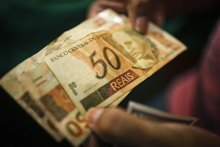 Notas de reais; dinheiro; imposto (Mario Tama/Getty Images)