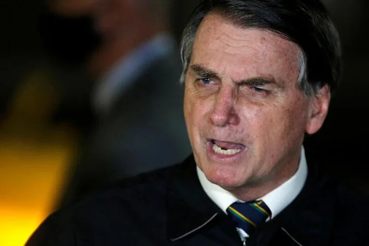 Jair Bolsonaro: sua chegada em Bagé provocou aglomerações em frente ao aeroporto da cidade e na escola onde foi recebido (Adriano Machado/Reuters)