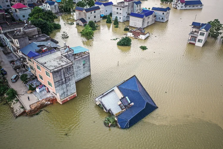 Enchentes: o volume de chuva no período é 51% superior à média, informou Guoguang (CHINA OUT. TPX IMAGES OF THE DAY/Reuters)