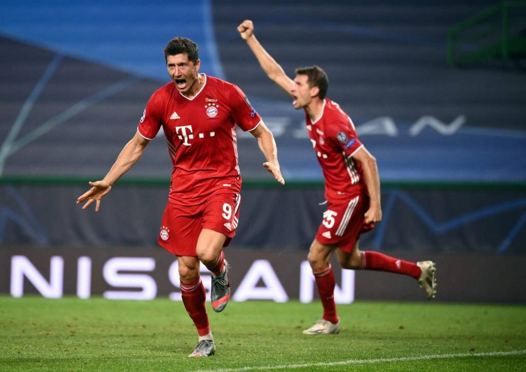 Jogadores do Bayern comemoram gol na Liga dos Campeões: modelo de financiamento com Adidas como acionista (Franck Fife/Pool via Getty Images/Getty Images)