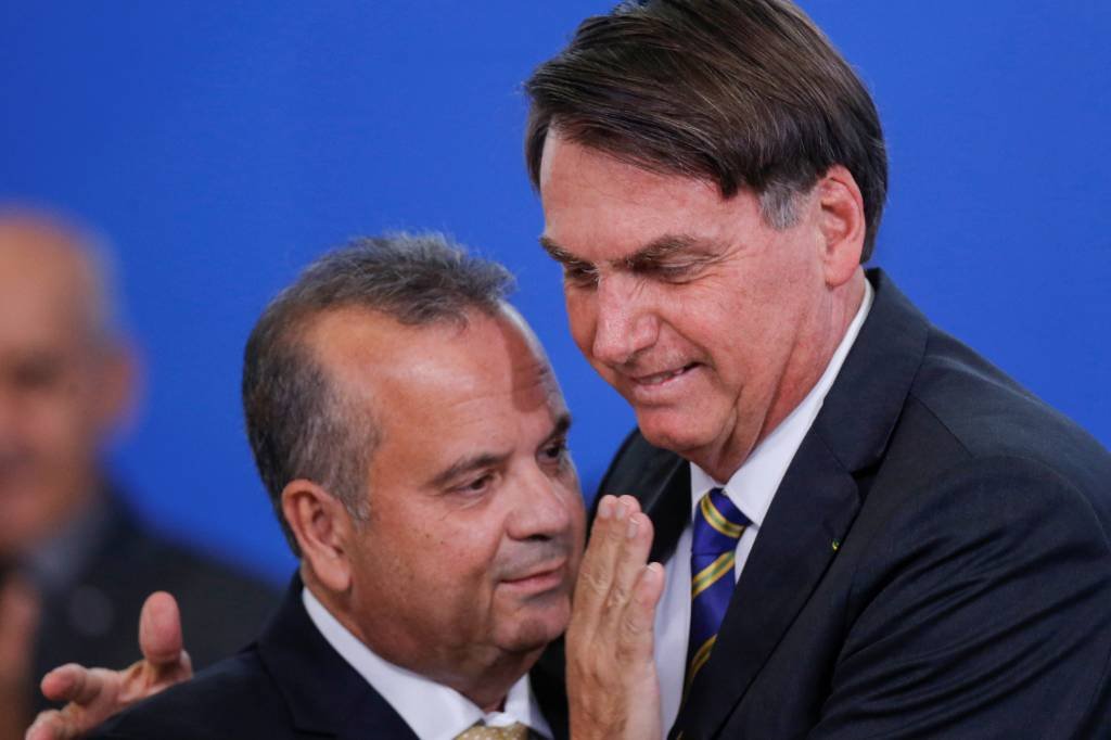 Rogério Marinho e Bolsonaro: Sem a presença de Guedes, evento de lançamento foi protagonizado pelo ministro do Desenvolvimento Regional (Adriano Machado/Reuters)