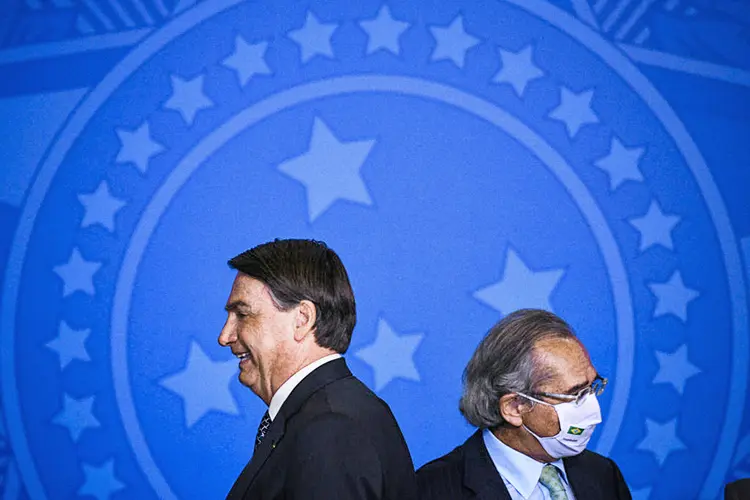 Jair Bolsonaro e Paulo Guedes, 19 de agosto de 2020. (Andre Borges/Getty Images)