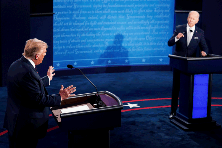Trump e Biden: os dois estão no grupo de risco, com mais de 70 anos (Morry Gash/Reuters)