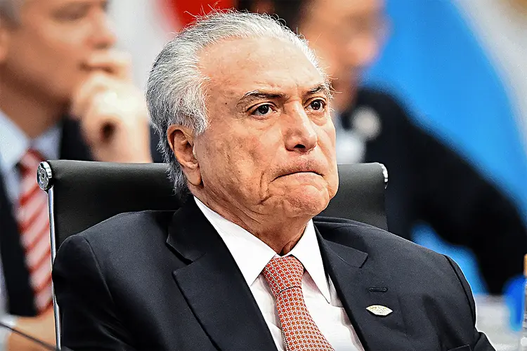 Temer foi vice da ex-presidenta Dilma Rousseff (PT), até assumir a Presidência, em 2016, quando ela sofreu impeachment (Amilcar Orfali / Correspondente/Getty Images)