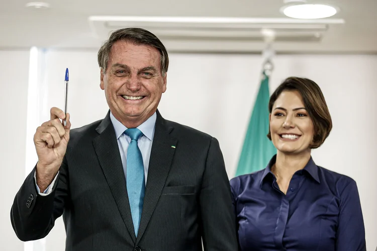 Bolsonaro e Michelle: ex-presidente foi tratado como a estrela do evento, denominado "Encontro Distrital do PL Mulher", sendo o último a discursar (Carolina Antunes/PR/Divulgação)