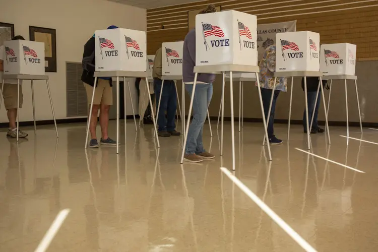 Eleitores votando nos EUA (Rachel Mummey/Bloomberg)