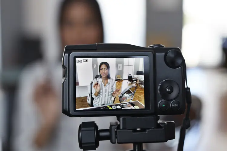Vlogger making making video at home in stylish urban apartment (gettyimages/Getty Images)