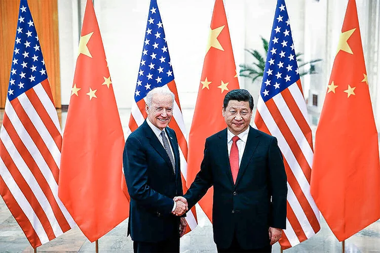 Joe Biden e Xi Jinping: apesar das tensões nas relações bilaterais, unidos na defesa do clima (Lintao Zhang/Getty Images)