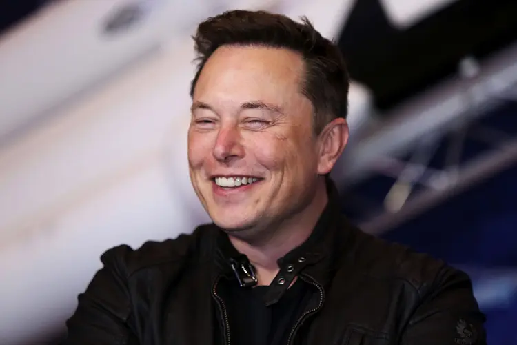 Elon Musk, fundador da Tesla: ascensão meteórica e apetite para mais (Bloomberg / Colaborador/Getty Images)
