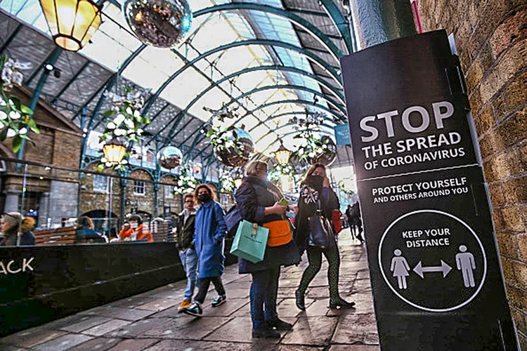 People visiting Covent Garden in London. (Photo by Yui Mok/PA Images via Getty Images) (Yui Mok/Getty Images)