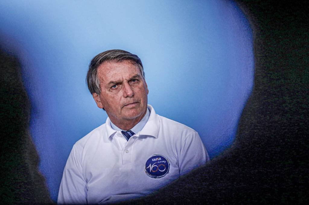 O presidente do Brasil, Jair Bolsonaro, participa de cerimônia no Palácio do Planalto em Brasília, Brasil, 12 de janeiro de 2021.  (Adriano Machado/Reuters)