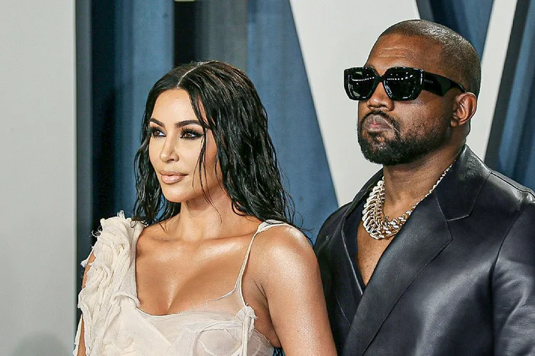 Kanye West e Kim Kardashian: várias revistas especializadas na vida das celebridades, como People ou Page Six, afirmam, porém, que Kim Kardashian está disposta a pedir o divórcio. (AFP/AFP)