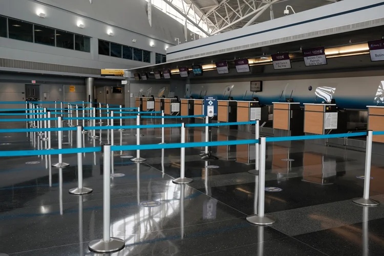 An international terminal at John F. Kennedy Airport on Jan. 25. Commercial flights worldwide as of Feb. 1 wallowed at less than half pre-pandemic level. (Bloomberg/Bloomberg)