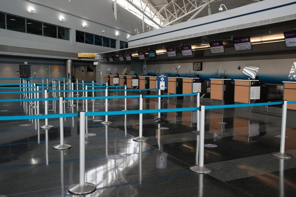An international terminal at John F. Kennedy Airport on Jan. 25. Commercial flights worldwide as of Feb. 1 wallowed at less than half pre-pandemic level. (Bloomberg/Bloomberg)