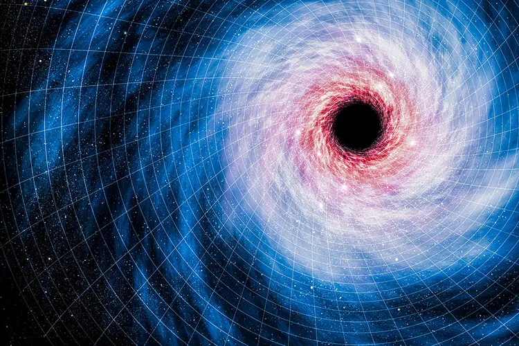 Buraco negro: fenômeno observado estava a 800 milhões de anos-luz de distância da Terra. (MARK GARLICK/SCIENCE PHOTO LIBRARY/Getty Images)