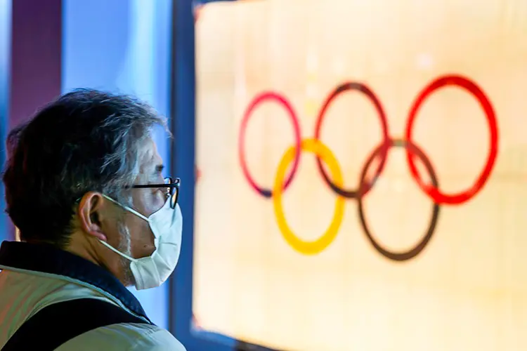 Autoridades admitiram que os Jogos de Verão em Tóquio serão "diferentes" de qualquer Olimpíada anterior (Athit Perawongmetha/Reuters)