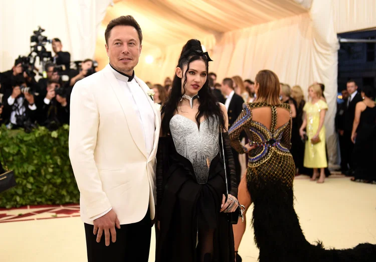 Elon Musk e Grimes (Jason Kempin/Getty Images)