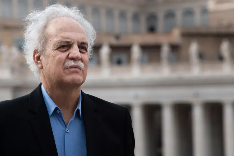 Brazilian climatologist Carlos Nobre poses for a picture during an interview with AFP at the Vatican on October 10, 2019. - Carlos Nobre is calling for a bioeconomic plan to save the Amazon by drawing on its wealth of berries and nuts, an idea championed at a key Vatican summit. "The Amazon has great economic potential", said Nobre, who has studied the tropical habitat for 40 years and contributed to a scientific report for the special three-week assembly of Catholic bishops on the Pan-Amazonian region. (Photo by Tiziana FABI / AFP) / TO GO WITH AFP STORY BY KELLY VELASQUEZ AND CATHERINE MARCIANO (Photo by TIZIANA FABI/AFP via Getty Images) (Tiziana FABI/AFP)