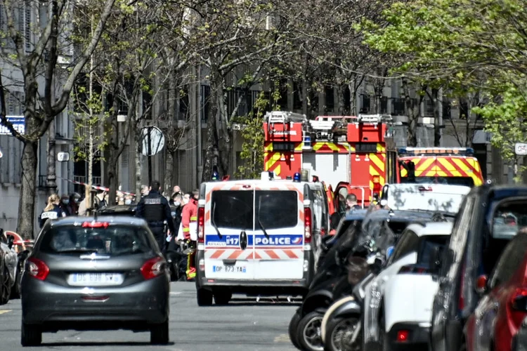 Police and first aid firefighters are pictured outside the Henry Dunant private hospital where one person was shot dead and one injured in a shooting in front of the institution owned by the Red Cross in Paris' upmarket 16th district on April 12, 2021. (Photo by Anne-Christine POUJOULAT / AFP) (Photo by AFP via Getty Images) (ANNE-CHRISTINE POUJOULAT//Getty Images)